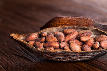 Cocoa pod on wooden background