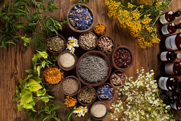 Herbal medicine on wooden desk background - obrazy, fototapety, plakaty