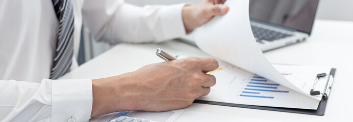 Marketing businessmen are analyzing financial and insights strategies for generating revenue...
