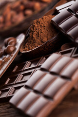 Chocolate bar, candy sweet, dessert food on wooden background