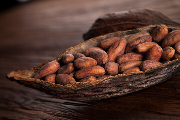 Cocoa pod on wooden table
