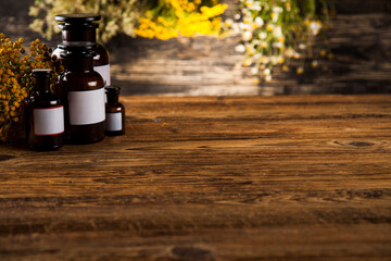 Medicine bottles and herbs background