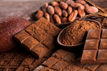 Chocolate bar, candy sweet, dessert food on wooden background