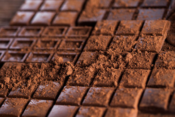 Chocolate bar, candy sweet, dessert food on wooden background