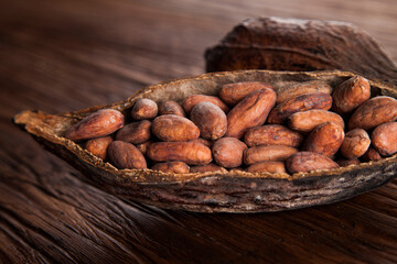 Cocoa pod on wooden table