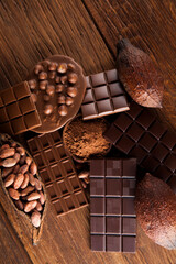 Chocolate bar, candy sweet, dessert food on wooden background