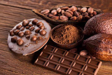 Chocolate bar, candy sweet, dessert food on wooden background