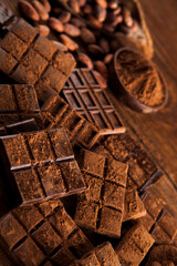 Bars Chocolate , candy sweet, dessert food on wooden background