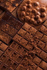 Chocolate bar, candy sweet, dessert food on wooden background
