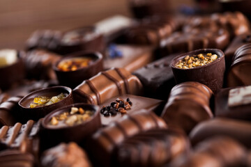 Praline Chocolate on wooden backgroud