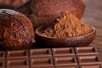 Chocolate bar, candy sweet, dessert food on wooden background