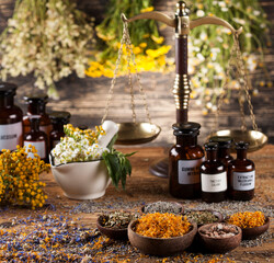 Herbal medicine on wooden desk background