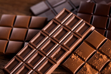 Bars Chocolate , candy sweet, dessert food on wooden background