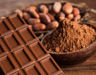 Cocoa pod and chocolate bar and food dessert background