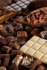 Dark and milk chocolate bar on a wooden table