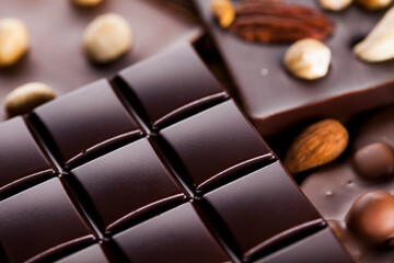 Chocolate bar, candy sweet, dessert food on wooden background