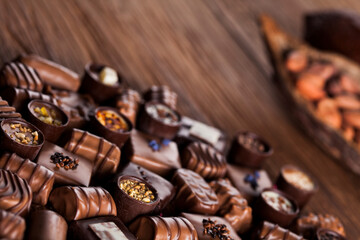 Praline Chocolate on wooden backgroud
