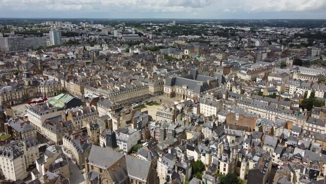 Rennes city center with Brittany Parliament in background, France. Aerial forward