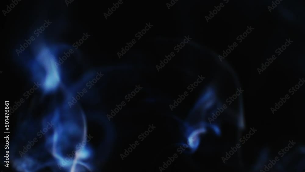 Poster abstract blue color smoke with a black background in slow motion. realistic cloud smoke with a strea