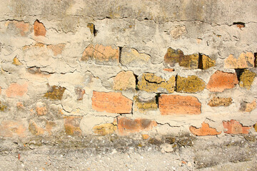 Brick wall with streaks of concrete. High quality photo