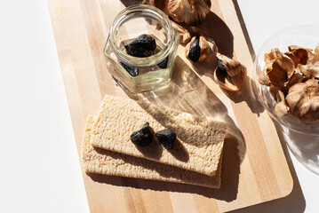 Fermented black garlic, health food. Healthy nutrition, fermented food, selective focus