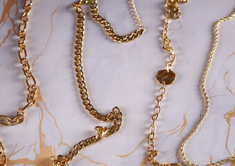gold jewelry chain necklace on background