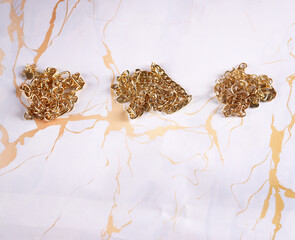 gold jewelry chain necklace on background