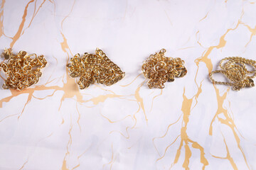 gold jewelry chain necklace on background