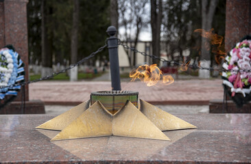 Eternal flame in the shape of a star in a provincial town.