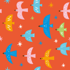 Seamless pattern with colored birds on red background. Fabric pattern, kids apparel print, wrapping paper