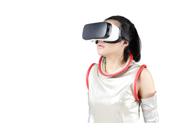 Female robot wearing VR goggles on studio