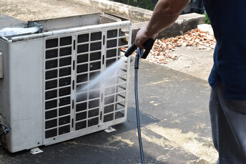  Worker cleaning air conditioner dirty machine. air condition cleaning.