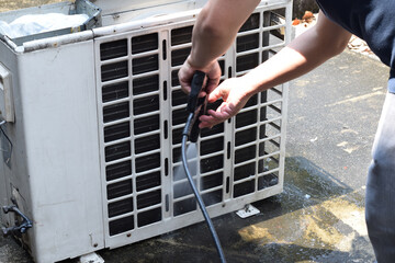 Air condition cleaning concept. Aircondition Maintenance. Technician cleanning air service and maintenance.
