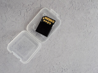 close up of an open  white  transparent memory card case with insert for UHS II SD and CFexpress...