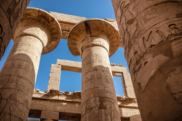 Different columns with hieroglyphs in Karnak temple. Karnak temple is the largest complex in...