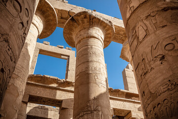 Different columns with hieroglyphs in Karnak temple. Karnak temple is the largest complex in...