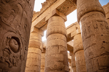 Different columns with hieroglyphs in Karnak temple. Karnak temple is the largest complex in ancient Egypt.