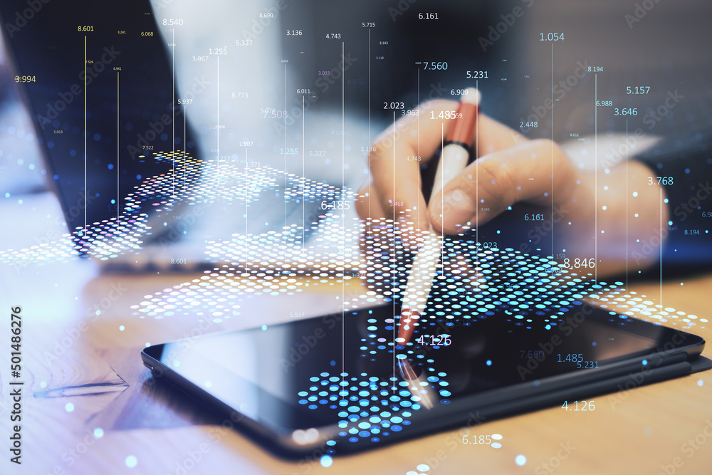Aufkleber Close up of hand at workplace using tablet with pen and abstract digital map and index lines on blurry background. Global infographic, world and location concept. Double exposure.