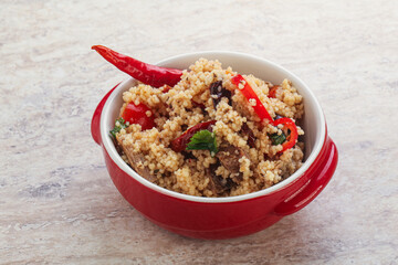 Arabic cous cous with meat and tomato