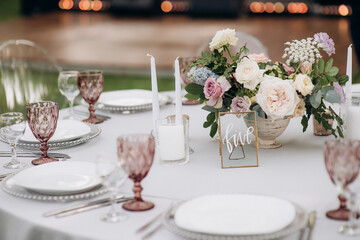 central flower arrangement on a served banquet table