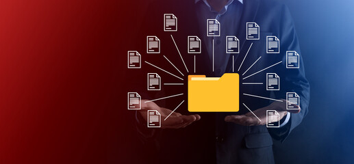 Document Management System DMS .Businessman hold folder and document icon.Software for archiving, searching and managing corporate files and information.Internet Technology Concept.Digital security.