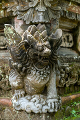 Fototapeta na wymiar old statue of mithycal creature on bali, indonesia