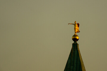 Closeup of the Angel of Peace on the spire of the Evangelical City Church of Karlsruhe in Germany