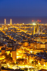 Barcelona skyline city town overview with Sagrada Familia church cathedral portrait format in Spain