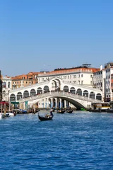 Fototapete Rialtobrücke Venice Rialto bridge over Canal Grande with gondola travel traveling holidays vacation town portrait format in Italy