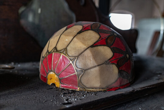 Vintage Stained Glass Lamp Globe At An Abandoned Warehouse