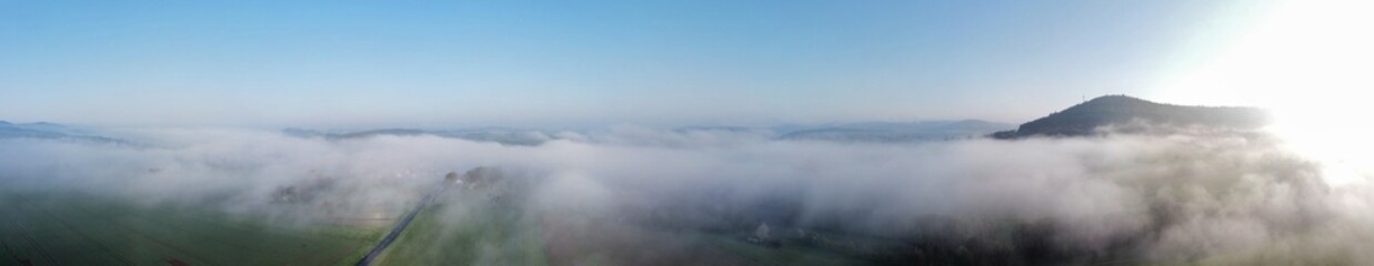 Morning fog in the Spessart Germany a drone flight