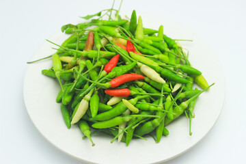 Green and Red Bird's Eye Chili Peppers. Isolated