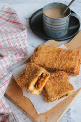Delicious homemade pastry. Sambal Anchovies Toast with Bread Crumbs. For breakfast, tea break and between meals snack.
