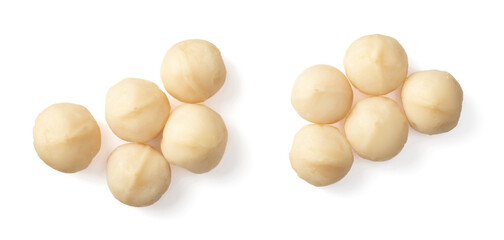 Shelled Macadamia nuts isolated on white background, top view.